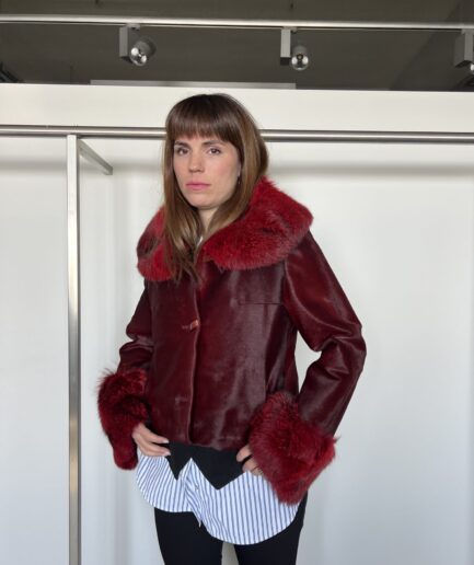 Genuine hair-on cherry leather coat, real hide transitional jacket.Luxurious lightweight calf jacket with buttons and fox fur details.