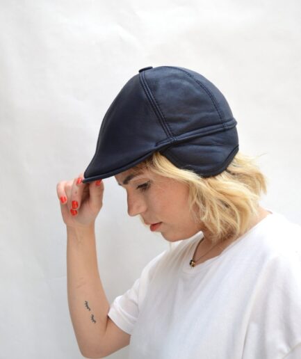 Real shearling Equestrian riding cap with ears flaps and velour lining inside. Cloche hat, sophisticated bomb sheepskin hat. Unisex gift.