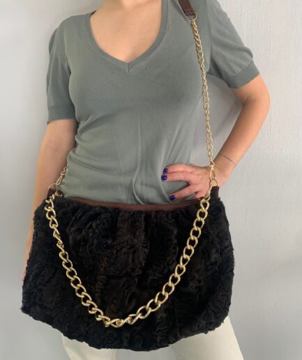 Real cloud pouch lamb fur in brown slouchy shoulder bag with two bronze straps. Unique Luxury fur gift cross-bag.