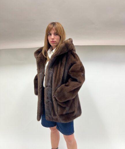 Real brown mink hooded jacket,Saga Demi buff straight line jacket with external pockets . Practical and affordable real fur in a budget.