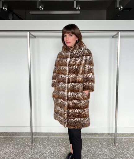 Real sectional mink fur coat in leopard printed in horizontal technique with stand up collar. Real fur in a budget.