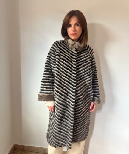 Handwoven Mink Fur coat with knitted lining.